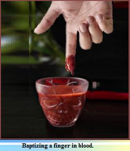 immersing a finger in blood; the body is not bapitzed in blood.